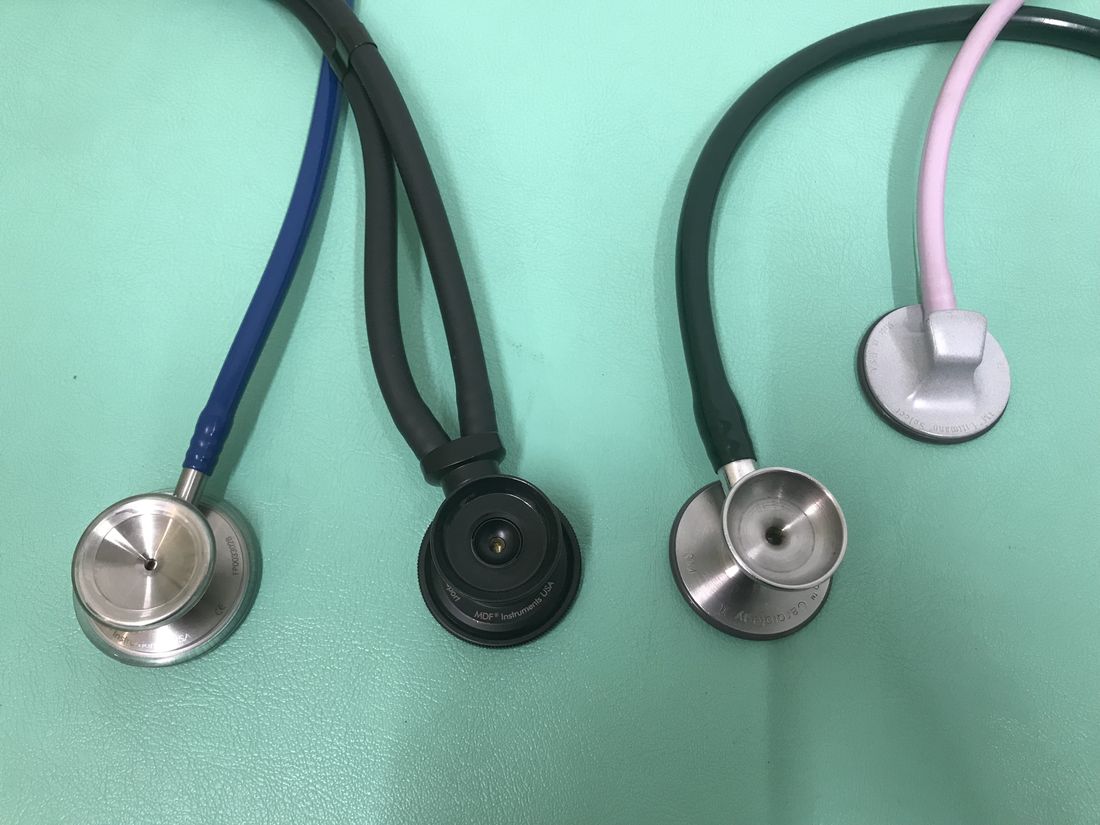 A stethoscope on a desk