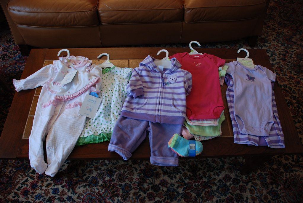 Baby clothes laid out