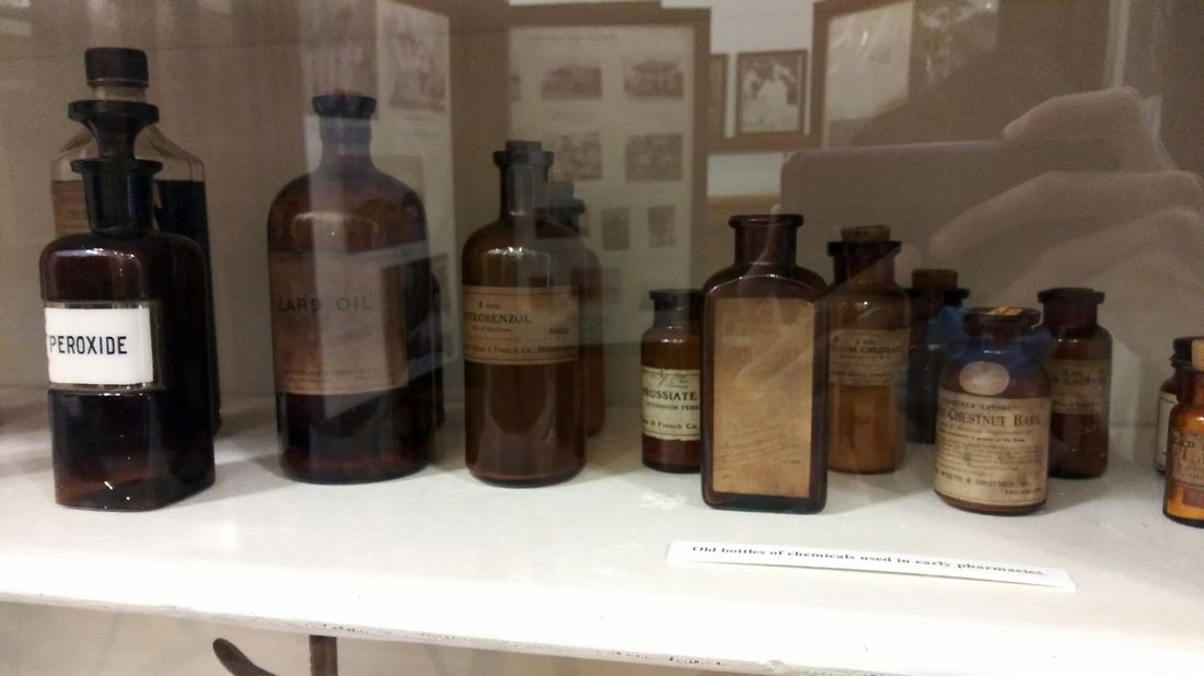 Antique medicine bottles in a museum in Cedar Key, Florida
